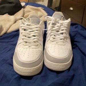 White and gray Air Force 1s